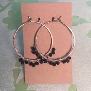 Hoop earrings with black beads